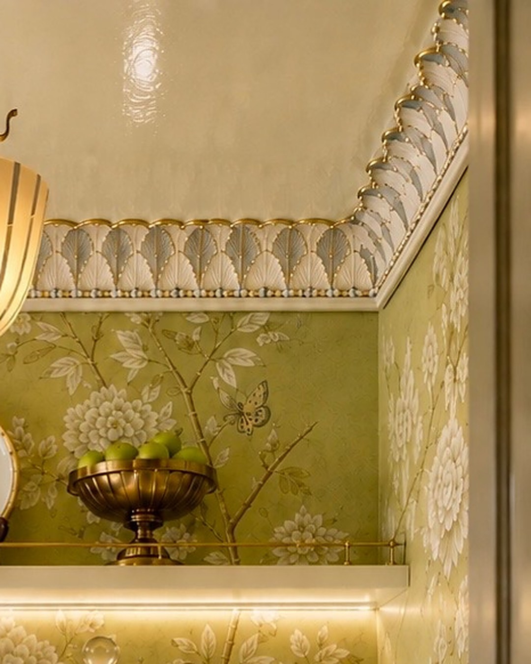 Painted palmette frieze with brass rail and chequered bead where the wall meets a lacquered ceiling